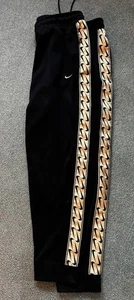 Nike Woman’s XXL Black Silky Pants w/side Designs and pockets. - Picture 1 of 7
