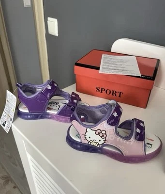 Sandalias iluminadas Hello Kitty para niñas - Sandalias causales de caña baja con luces LED  Foto 1 de 4