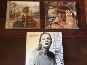 Taylor Swift [3 CD Alben]  Red (Taylor's Version) + Reputation (+DVD)+ Evermore - Bild 1 von 1