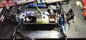 Team Associated MGT 8.0 CHASSIS AND PARTS 3 TRUCKS IN PIIECES. FOR PARTS ONLY! - Picture 1 of 24