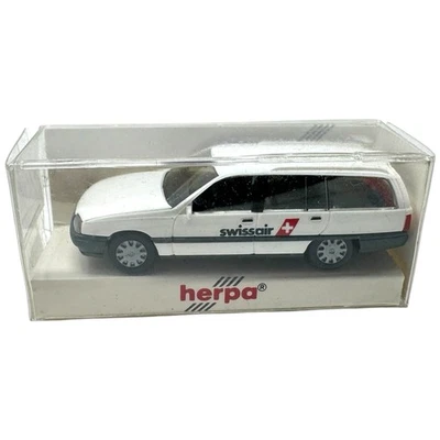 Herpa Opel Omega 041935 SWISSAIR Modellauto - 1:87 H0 INKgrafiX TOYS A332 - Bild 1 von 4