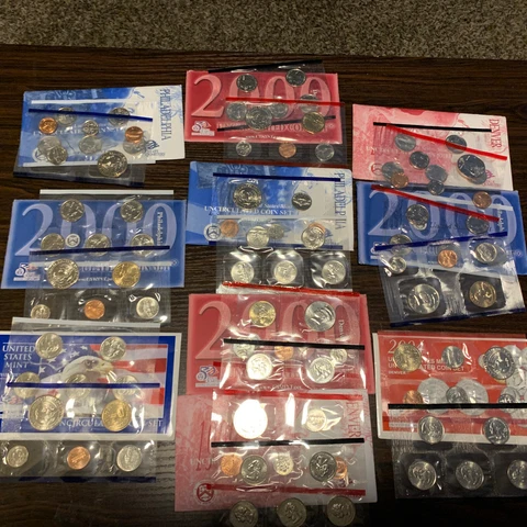 Uncirculated Sets, 1999, 2000,2003 & 2004.  10 Total Also 1996 Silver Proof Set Cover