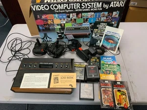 Vintage ATARI 2600 System 4 + Games Lot  Manuals Box More Vintage Box Woodgrain - Picture 1 of 1