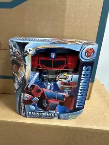 TRANSFORMATOREN EARTHSPARK SPINWECHSLER 8 ZOLL OPTIMUS PRIME UND 2 ZOLL ROBB MALTO - Bild 1 von 4
