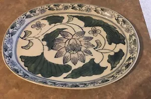 Bandeja de baratija ovalada de cerámica vintage, flores, enredaderas cara de pixie 8"x10" - Imagen 1 de 4