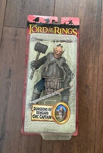 El Señor de los Anillos Dos Torres MAZMORRAS DE ISENGARD CAPITÁN ORCO 2004 ToyBiz Nuevo en Caja - Imagen 1 de 7