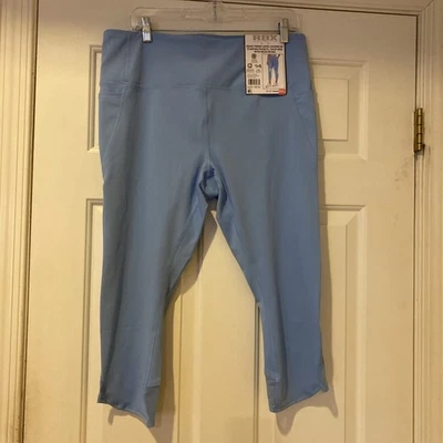 Женские леггинсы RBX Capri размер 2XL синие с плавающими карманами тюльпановый подол сетка деталь - Изображение 1 из 4