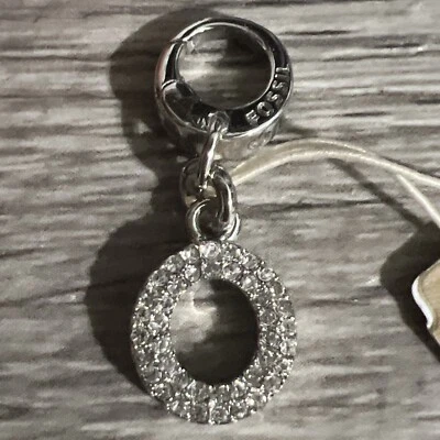 Dije Fósil Cristal Blanco Circonita Pavé Letra O Foto 1 de 4
