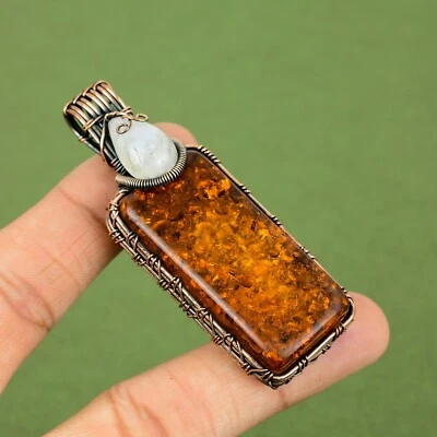 Colgante envuelto en alambre de cobre hecho a mano con piedras preciosas de ámbar prensado CSP-02 Foto 1 de 4
