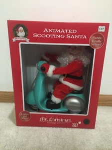 Animated Santa Riding a Scooter Moves Lights and Plays 24 Songs NEW - Picture 1 of 6
