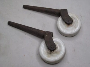 2  antique castor wheels  metal & porcelain furniture wheel pair - Picture 1 of 4