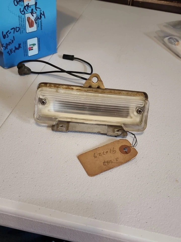 Chevrolet Chevelle 1965 luz de respaldo/lámpara GM 910729 65 SS OEM RARO Foto 1 de 4