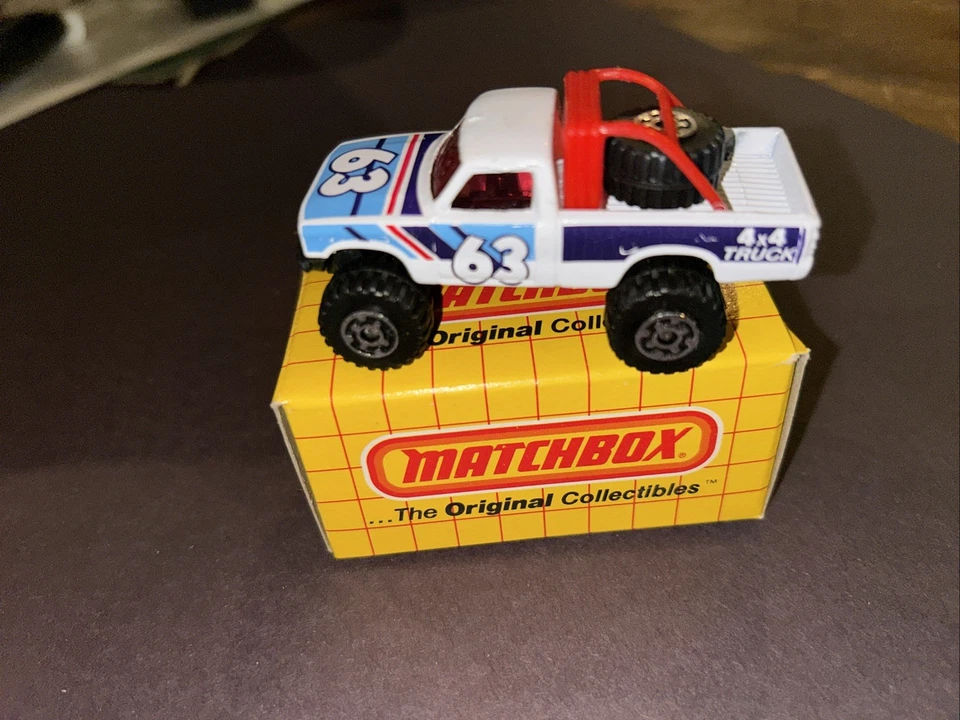 Спичечный коробок 4X4 Toyota Open Back Dunes Racer 63 пикап No 13 1981 винтажный - Изображение 1 из 1