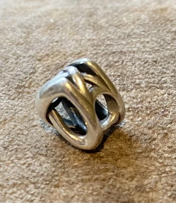 Authentic Pandora Silver Openwork Knotted Heart Charm 798081 - .925 - Image 1 of 4