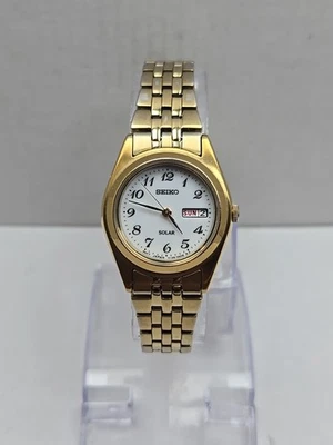 Seiko Solar Womens Gold Tone Day Date Watch White Dial 26mm V138 Works Size Sm - Image 1 of 4