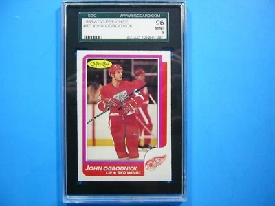 1986/87 O-PEE-CHEE NHL HOCKEY CARD #87 JOHN OGRODNICK SGC 9 MT SHARP+ 86/87 OPC - Image 1 of 2