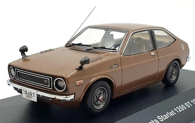Ixo Escala 1/43 Diecast KB1057 - Toyota Starlet 1200 SR 1973 - Marrón Metálico Foto 1 de 4