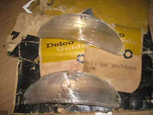 1955 CHEVY PAIR NOS PARK & TURN OEM CLEAR LENSES - Picture 1 of 3