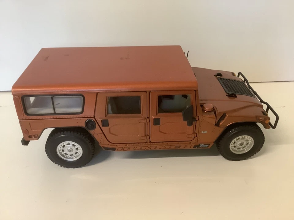 2002 Hummer H1 Maisto 1:18 Scale Diecast Burnt Orange 10th Anniversary Edition - Image 1 of 4