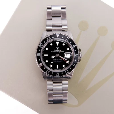 Reloj Rolex 16700 GMT Master 1990 negro de acero inoxidable Foto 1 de 4