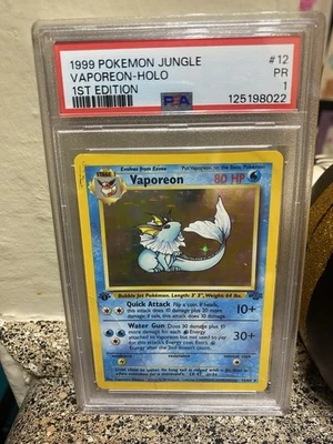 PSA 1 PR 1999 1ST EDITION Pokemon Jungle Vaporeon 12/64 Holo Foil Rare WOTC - Image 1 of 4