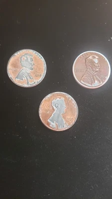 coins us error penny's die cast error lot of 3, silver die cast, 2018,1994,1990 - Image 1 of 2