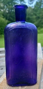 Vintage PURPLE Irradiated Glass MEDICINE BOTTLE 6'' × 2 1/2" × 1" Bruised Lip - Picture 1 of 7