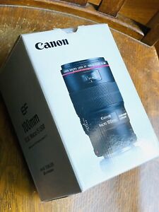 comme neuf avec avec emballage : objectif Canon EF 100 mm f/2,8 L macro IS USM.   Livraison gratuite.