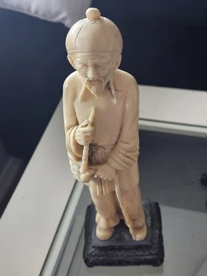 Antigua estatua china de pequeño anciano Foto 1 de 4