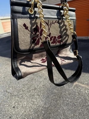 Bolso Muñequera Cavalcanti Foto 1 de 4