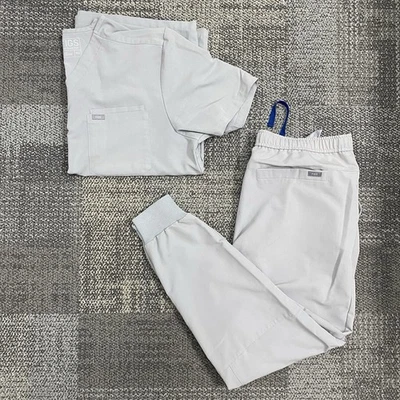 Conjunto Exfoliante FIGS Technical Hombre XXL León Top y XL Pantalones Jogger Cemento Color Raro Foto 1 de 4