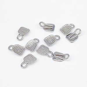 Botones linguales de ortodoncia dental base rectangular cerámica adhesiva 10 piezas - Imagen 1 de 7