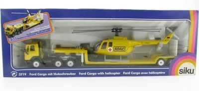 SIKU 3719 Ford Cargo Tieflader mit ADAC Hubschrauber 1:55 in OVP LKW Modell - Bild 1 von 4