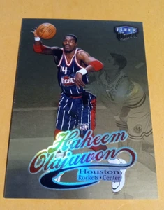 1998-99 Fleer Ultra Gold Medallion Hakeem Olajuwon tarjeta de la NBA #68G - Rockets - Imagen 1 de 2