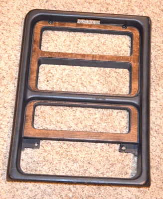 1985-1988 MERCURY COUGAR DASH BEZEL TRIM RADIO CLIMATE SURROUND OEM 86 87 Foto 1 de 4