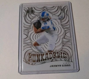 2023 Panini Illusions - Funkadelic Jahmyr Gibbs #15 (RC) - Picture 1 of 2