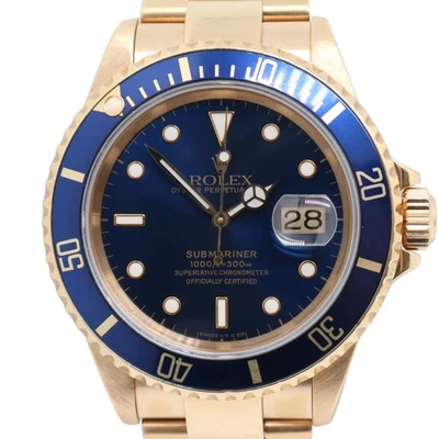 Reloj Rolex 16618 Submariner 1990 vintage 40 mm oro amarillo 18 quilates azul sobre azul Foto 1 de 4