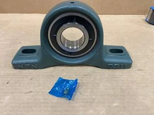 NTN UKP311D1 CUSCINETTO BLOCCO CUSCINO ALBERO VENTOLA FORO 2 1/4" 206385 - Foto 1 di 7