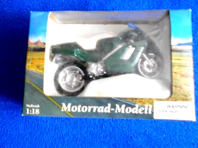 4 Model Motorräder 1:18 - Bild 1 von 4