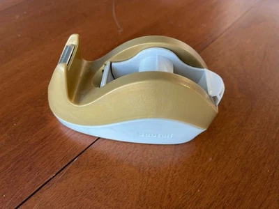 Dispensador de cinta de escritorio Scotch 3M dorado y blanco diseño de conejo serie ponderado Foto 1 de 4