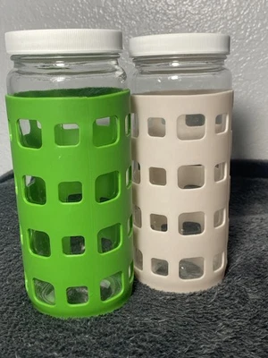Two 16oz glass bottles with plastic lids and removable rubber sleeve - Image 1 of 4