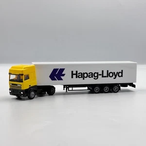 DAF 95 with yellow semitrailer white Hapag-Lloyd scale 1/87 (HO) - Picture 1 of 6