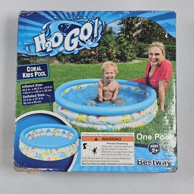Piscina para niños H2O Go Coral -NUEVA-edades 2 y más-inflada 40 pulgadas X 40 X 10 tiene capacidad para 27 gal. Foto 1 de 4