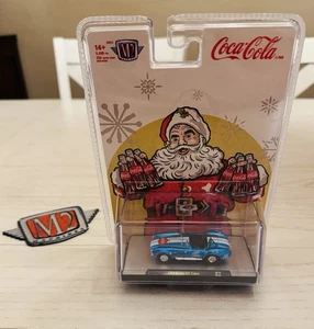 M2 Machines 2025 Coca-Cola Christmas 1965 Shelby 427 Cobra Holiday Edition - Picture 1 of 2