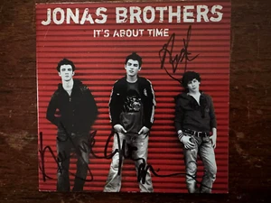 the Jonas Brothers signed It's About Time cd booklet ( no CD) - Picture 1 of 1