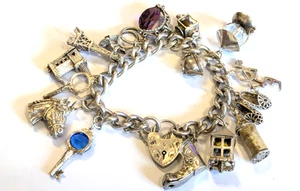 Hallmarked Vintage sterling silver charm bracelet 103.7 gms - Picture 1 of 19