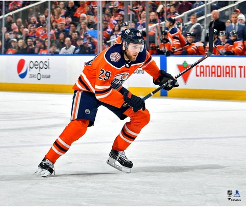 Leon Draisaitl Edmonton Oilers Unsigned Orange Jersey Skating 20" x 24" Photo Cover