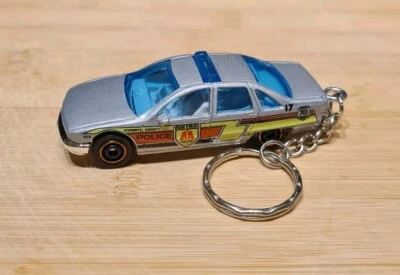 MATCHBOX DIECAST CHEVY CAPRICE CLASSIC METRO POLICE KEYCHAIN KEYRING  - Image 1 of 4
