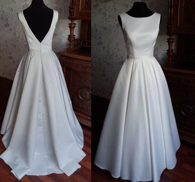 Vestidos de novia de satén sin mangas cortos hasta el té simple blanco marfil vestido de novia Foto 1 de 4