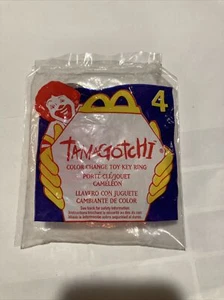 1998 Tamagotchi McDonalds Happy Meal Spielzeug gelb Schlüsselanhänger #4 Neu in Verpackung - Bild 1 von 3